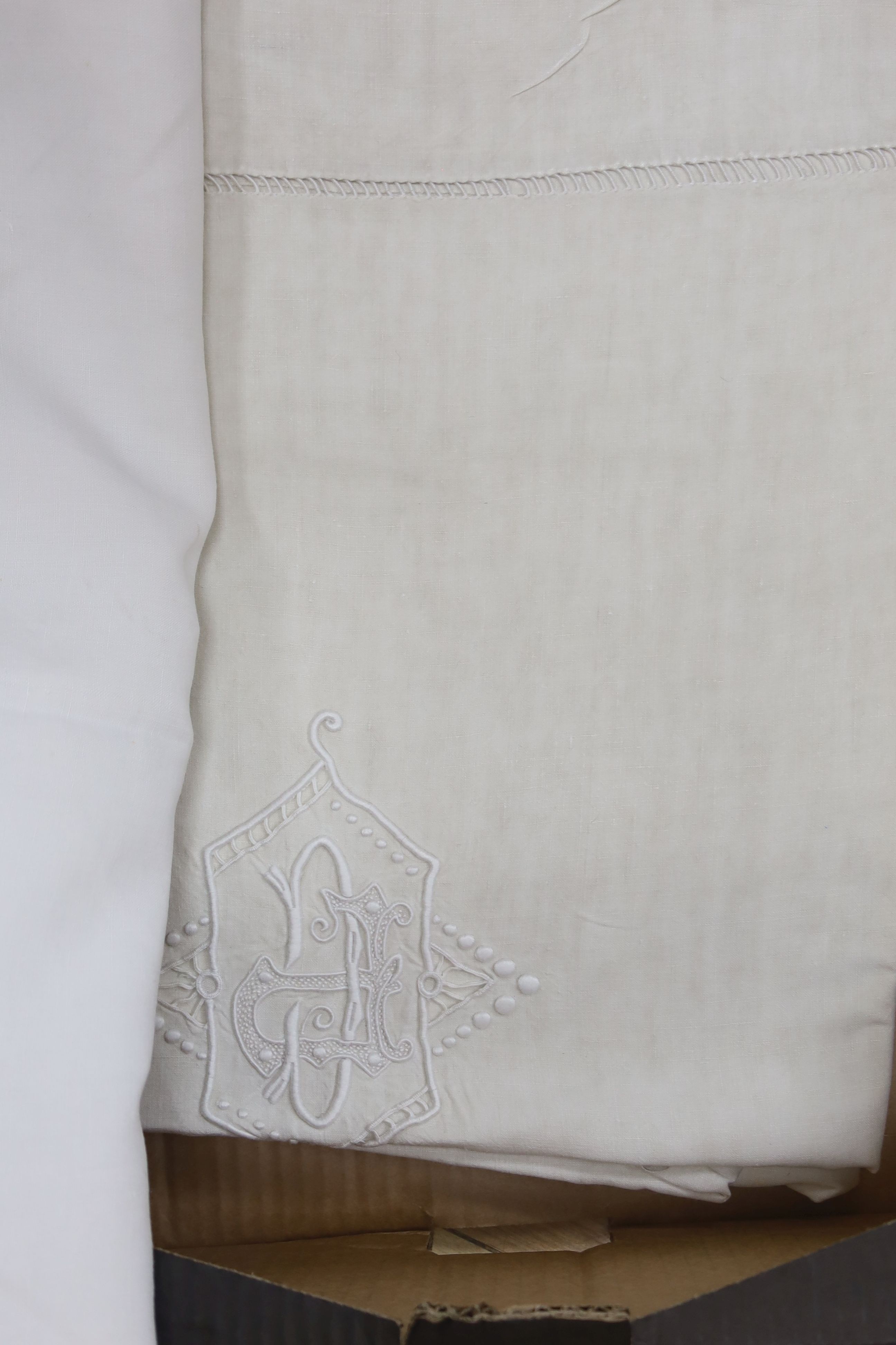 Six French provincial embroidered and cutworked sheets